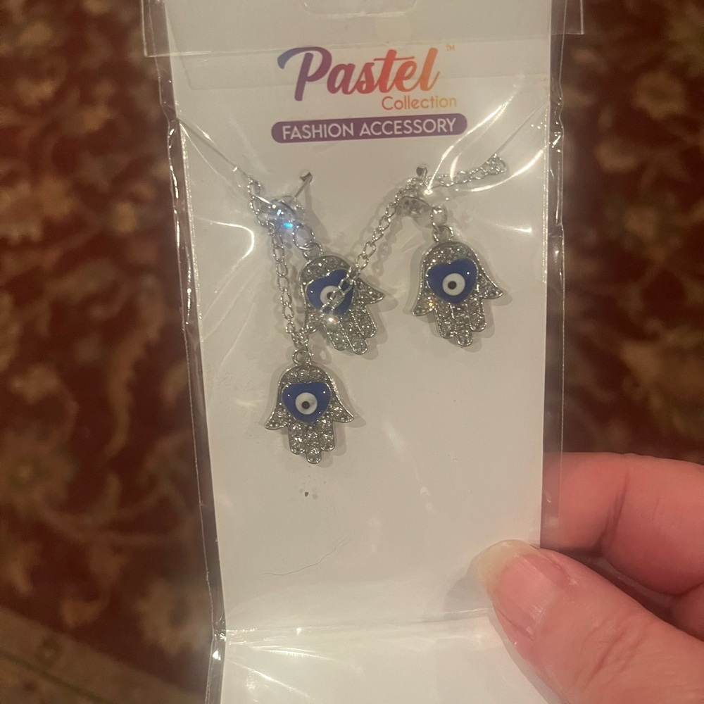 Silver Hamsa Necklace with Blue Evil Eye Accent